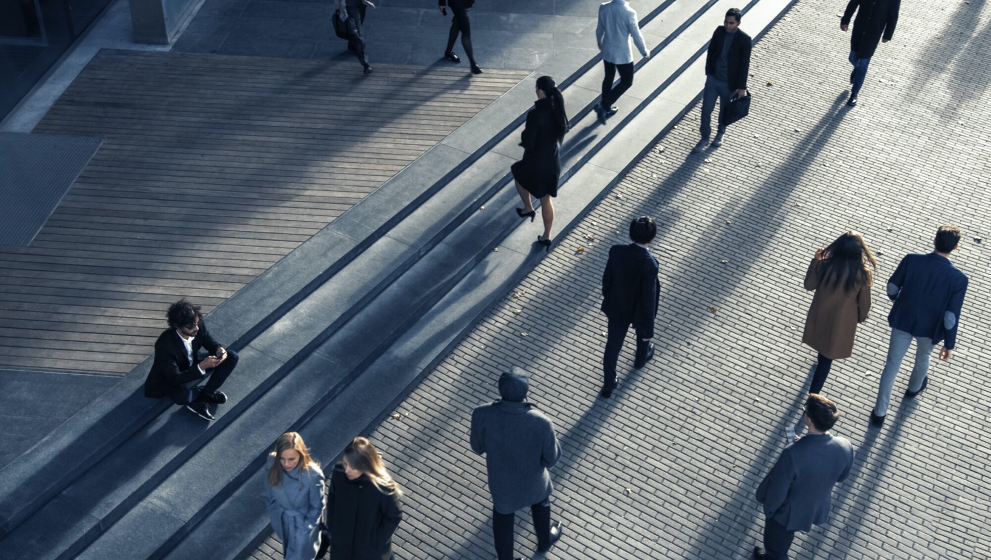 People moving through a working city environment
